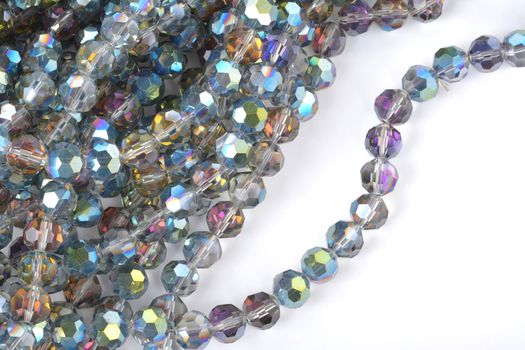 Beautiful color silver gray Glass Sparkle Crystal Isoalted Beads on white background. Use for diy beaded jewelry