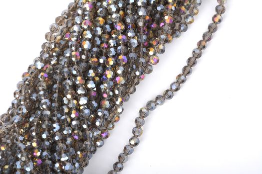 Beautiful color silver gray Glass Sparkle Crystal Isoalted Beads on white background. Use for diy beaded jewelry