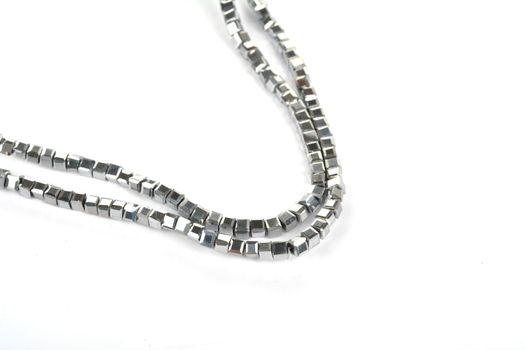Beautiful color silver gray Glass Sparkle Crystal Isoalted Beads on white background. Use for diy beaded jewelry