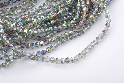Beautiful color silver gray Glass Sparkle Crystal Isoalted Beads on white background. Use for diy beaded jewelry