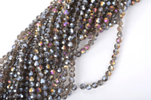 Beautiful color silver gray Glass Sparkle Crystal Isoalted Beads on white background. Use for diy beaded jewelry