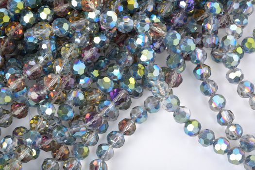 Beautiful color silver gray Glass Sparkle Crystal Isoalted Beads on white background. Use for diy beaded jewelry
