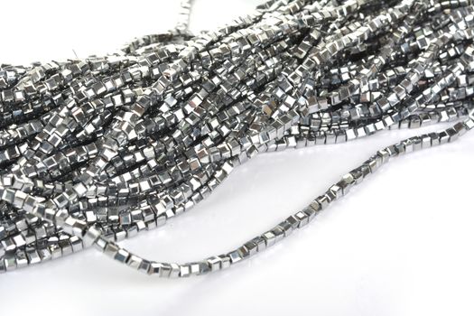 Beautiful color silver gray Glass Sparkle Crystal Isoalted Beads on white background. Use for diy beaded jewelry