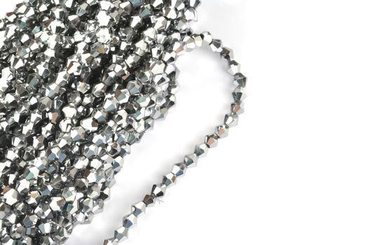Beautiful color silver gray Glass Sparkle Crystal Isoalted Beads on white background. Use for diy beaded jewelry