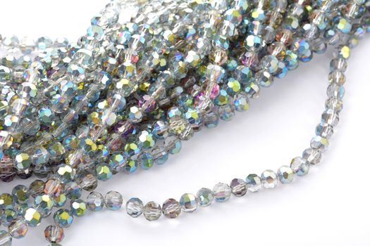 Beautiful color silver gray Glass Sparkle Crystal Isoalted Beads on white background. Use for diy beaded jewelry