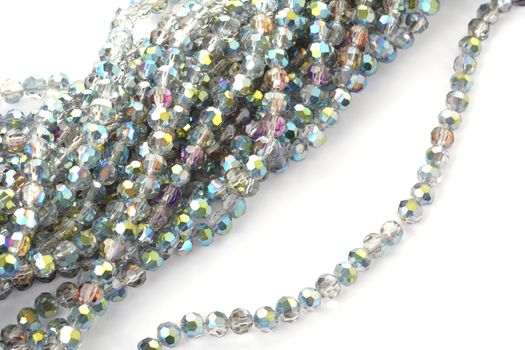 Beautiful color silver gray Glass Sparkle Crystal Isoalted Beads on white background. Use for diy beaded jewelry