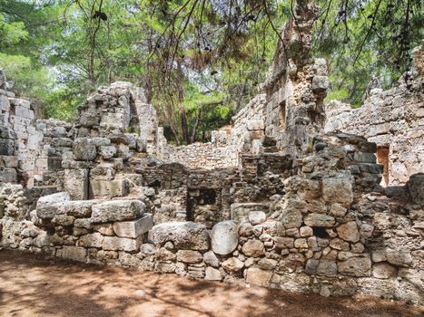 Ruins of large bath in ancient Phaselis city. Famous architectural landmark, Kemer district, Antalya province. Turkey.