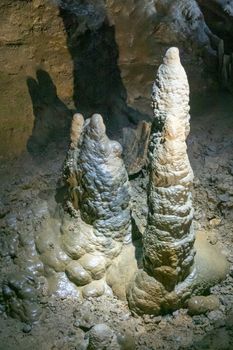 Han-sur-Lesse, Belgium - June 25, 2019: Grottes-de-Han 1 of 36. subterranean pictures of Stalagmites and stalactites in different shapes and colors throughout tunnels, caverns and large halls.