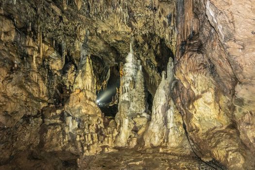 Han-sur-Lesse, Belgium - June 25, 2019: Grottes-de-Han 2 of 36. subterranean pictures of Stalagmites and stalactites in different shapes and colors throughout tunnels, caverns and large halls.