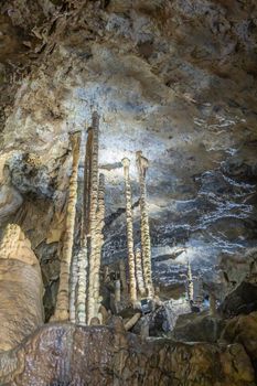 Han-sur-Lesse, Belgium - June 25, 2019: Grottes-de-Han 4 of 36. subterranean pictures of Stalagmites and stalactites in different shapes and colors throughout tunnels, caverns and large halls..