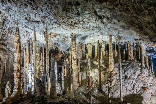 Han-sur-Lesse, Belgium - June 25, 2019: Grottes-de-Han 5 of 36. subterranean pictures of Stalagmites and stalactites in different shapes and colors throughout tunnels, caverns and large halls..