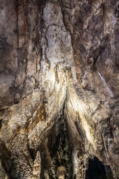 Han-sur-Lesse, Belgium - June 25, 2019: Grottes-de-Han 11 of 36. subterranean pictures of Stalagmites and stalactites in different shapes and colors throughout tunnels, caverns and large halls.. Flowing Rock formation.