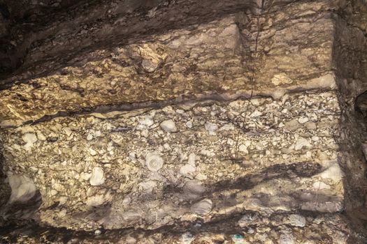 Han-sur-Lesse, Belgium - June 25, 2019: Grottes-de-Han 21 of 36. subterranean pictures of Stalagmites and stalactites in different shapes and colors throughout tunnels, caverns and large halls.. pressed rocks.