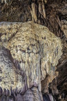 Han-sur-Lesse, Belgium - June 25, 2019: Grottes-de-Han 24 of 36. subterranean pictures of Stalagmites and stalactites in different shapes and colors throughout tunnels, caverns and large halls.. closeup.