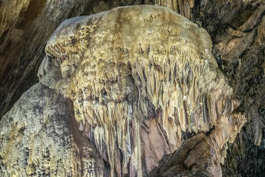 Han-sur-Lesse, Belgium - June 25, 2019: Grottes-de-Han 26 of 36. subterranean pictures of Stalagmites and stalactites in different shapes and colors throughout tunnels, caverns and large halls.. curtain.