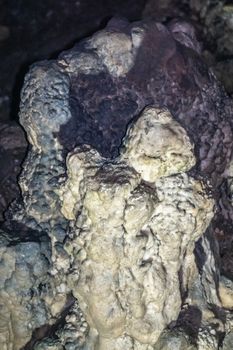 Han-sur-Lesse, Belgium - June 25, 2019: Grottes-de-Han 33 of 36. subterranean pictures of Stalagmites and stalactites in different shapes and colors throughout tunnels, caverns and large halls.