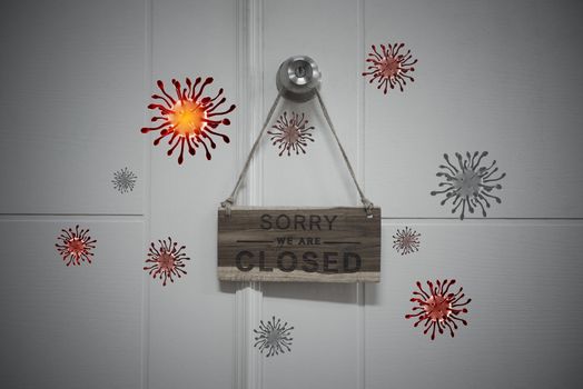 closed signboard hanging at the door covered by Corona virus (COVID-19)