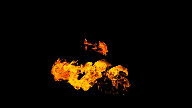 Fire flames on black background isolated. Burning gas or gasoline burns with fire and flames. Flaming burning sparks close-up, fire patterns. Infernal glow of fire in the dark with copy-space