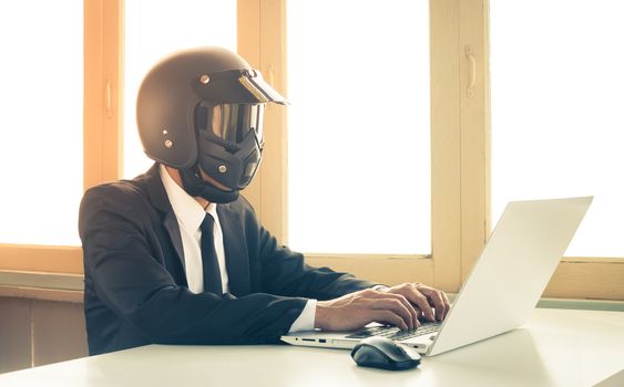 Vintage AI Artificial Intelligence Businessman Concept Typing Laptop in Home Office. Business concept about human replacement by AI Artificial Intelligence