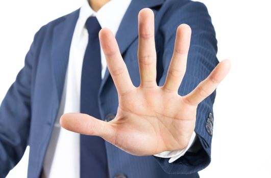 Businessman in Blue Suit Show Stop Sign of Hand Isolated on White Background. Concept about Stopping or Prevent.