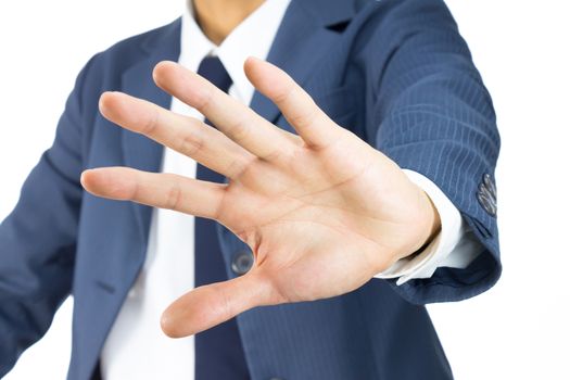 Businessman in Blue Suit Show Stop Sign of Hand on Tilt View Isolated on White Background. Concept about Stopping or Prevent.