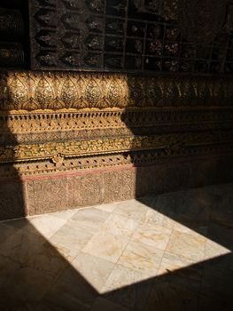 Light shining through a door of the temple