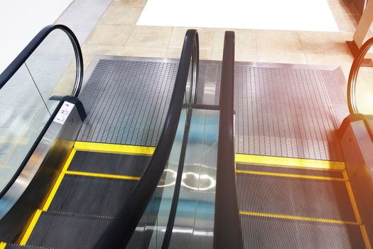 escalator in the indoor, urban landscape                               