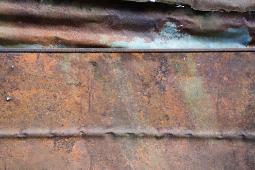 Dark worn rusty metal texture background.