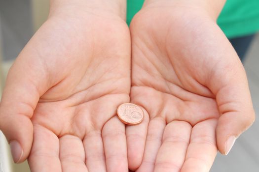 Child's hands  with money