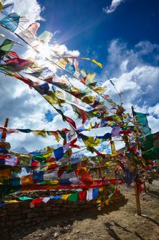 Buddist Prayer flags in Himalayas on top of Kunzum La pass, Himachal Pradesh, India. Elevation 4551 m.