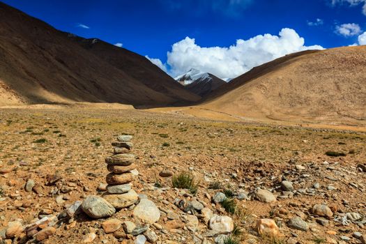 Stone cairn at Namshang La pass in Himalayas. Ladakh, India