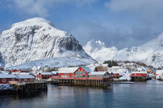 Traditional fishing village A on Lofoten Islands, Norway with red rorbu houses. With snow in winter