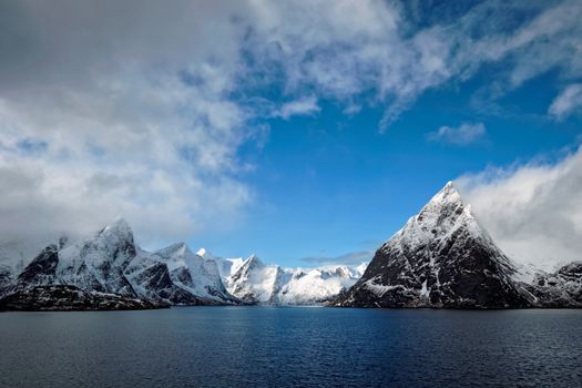 Norwegian fjord and mountains with snow in winter. Lofoten islands, Norway