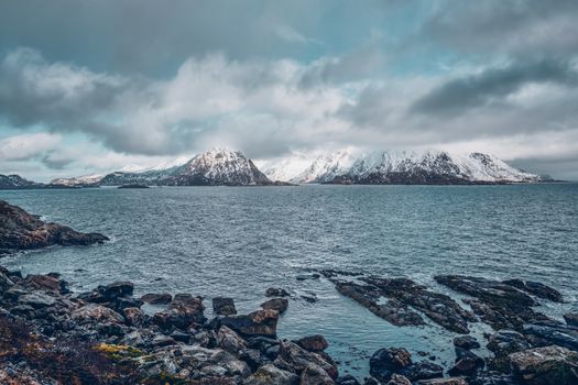 Norwegian fjord and mountains with snow in winter. Lofoten islands, Norway