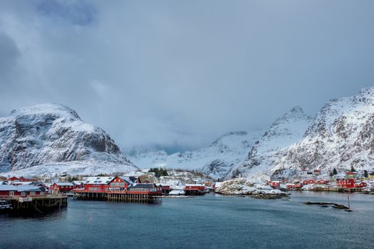 Traditional fishing village A on Lofoten Islands, Norway with red rorbu houses. With snow in winter