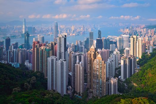 Famous view of Hong Kong - Hong Kong skyscrapers skyline cityscape view from Victoria Peak on sunset. Hong Kong, China