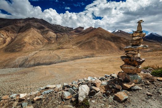 Stone cairn in Himalayas near Khardung La pass - allegedly the highest motorable pass in the world (5602 m)