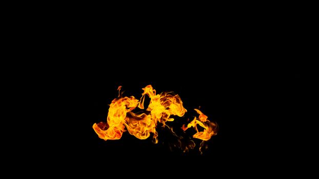 Fire flames on black background isolated. Burning gas or gasoline burns with fire and flames. Flaming burning sparks close-up, fire patterns. Infernal glow of fire in the dark with copy-space