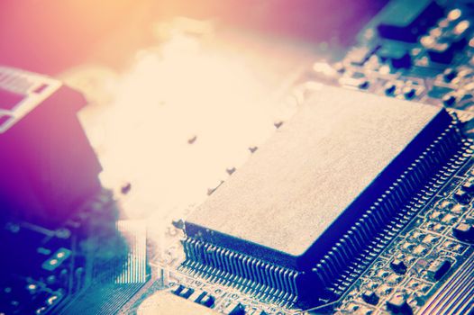 closeup of electronic circuit board with processor background retro effect image