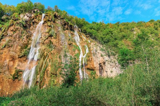 Landscape of waterfall among rocks in the forest. Plitvice Lakes National Park, Croatia. Nacionalni park Plitvicka Jezera, UNESCO World Heritage. 