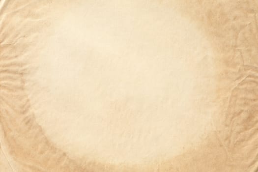 Old brown holistic crumpled paper background texture