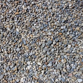 Small stones gravel texture. Naturally pebble textured background.