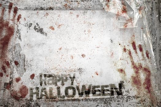 Happy Halloween background with grungy frame, bloody handprints, remains of scotch tape and cellophane. Vertical background fully editable. It can be used as a party invitation, food menu, poster, wallpaper, design t-shirts and more.