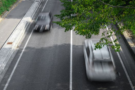 Motion blur of cars in aerial view over the road. (Speed limits - Infractions - Speed Cameras)