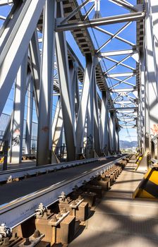 Steel bridge railroad. Railway metal bridge perspective view.
