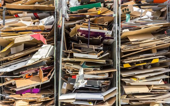 Stack of paper for recycling in metal containers