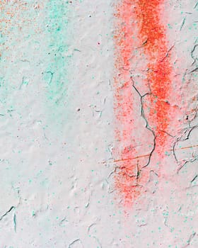 Fragment of colorful graffiti painted on a concrete wall. Bright abstract background for design.