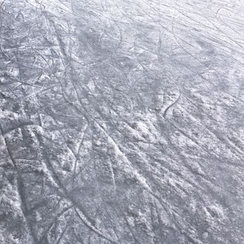 Ice background with marks from skating and hockey