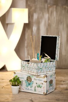 casket for needlework with flower, sewing in style interior