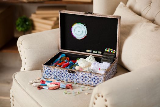 casket for needlework with flower, sewing in style interior